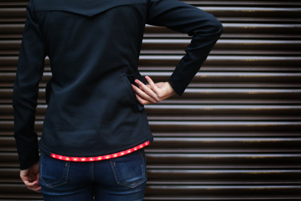 The jackets and bags contain ultra high brightness LED strips on both the front and back, subtly hidden within the construction of the design.
